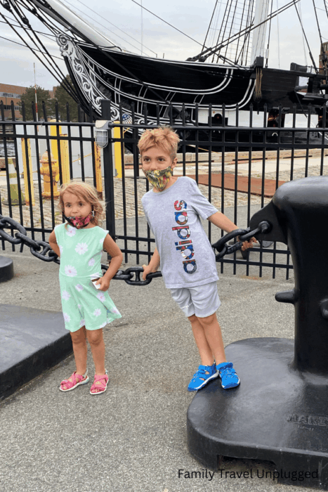 Ultimate Guide to Fun in Boston with Kids: Top Activities and Destinations 3 Kids enjoying fun activities at Boston attractions, with historic sites in the background.