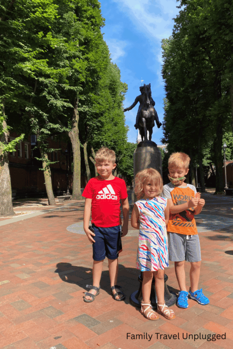 Ultimate Guide to Fun in Boston with Kids: Top Activities and Destinations 4 Happy family exploring Boston, with children enjoying interactive exhibits and historical tours.