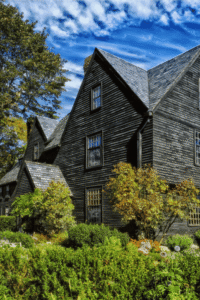 Family exploring historic Salem Massachusetts with kids enjoying museums, haunted sites, and unique local attractions.