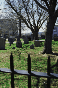 Kids and parents exploring historic Salem Massachusetts, smiling and engaged in activities.