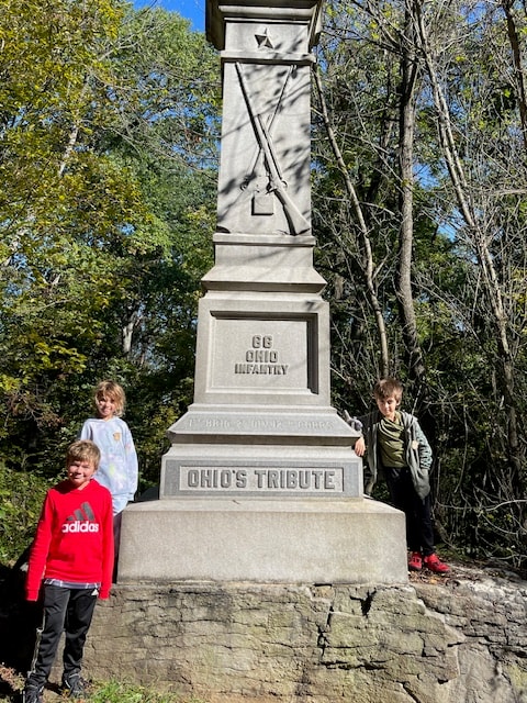 Families enjoying outdoor activities in Gettysburg's historical parks.