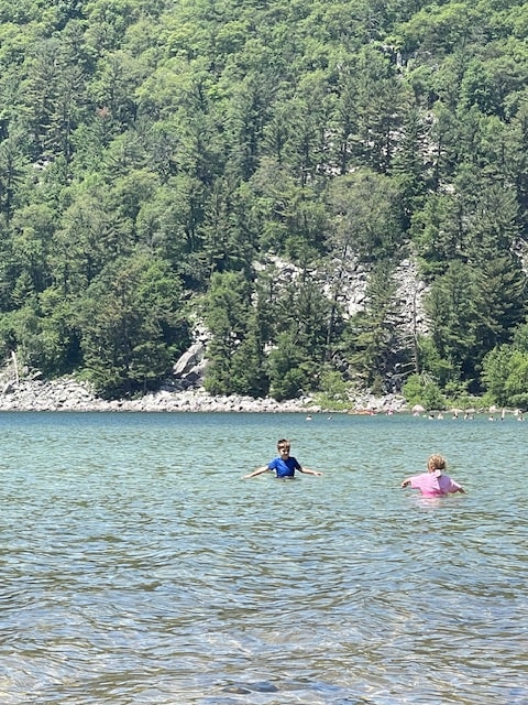 8 Top Activities at Devils Lake WI: An Amazing State Park 4 Rock climbers tackling the challenging cliffs at Devil's Doorway in Devil's Lake State Park.