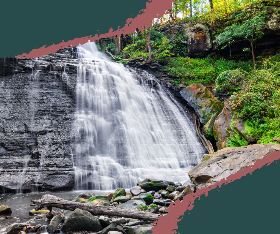 Brandywine Falls cascading over mossy limestone ledges in Cuyahoga Valley National Park, surrounded by fall colors and forest trails.