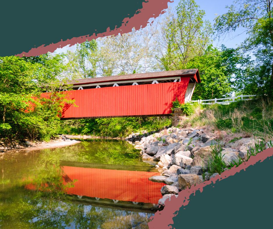 Historic red Everett Covered Bridge crossing Furnace Run in Cuyahoga Valley National Park, surrounded by forest and hiking trails. Cuyahoga Valley National Park
