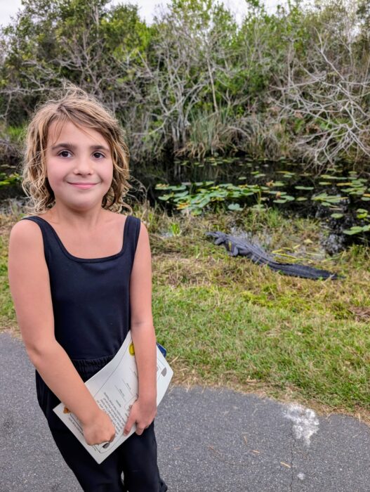 A family discussing safety tips while enjoying their time in the Everglades.