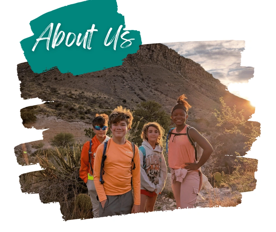 Family of six posing together during a roadtrip adventure, surrounded by scenic nature views. Roadtrip with kids.