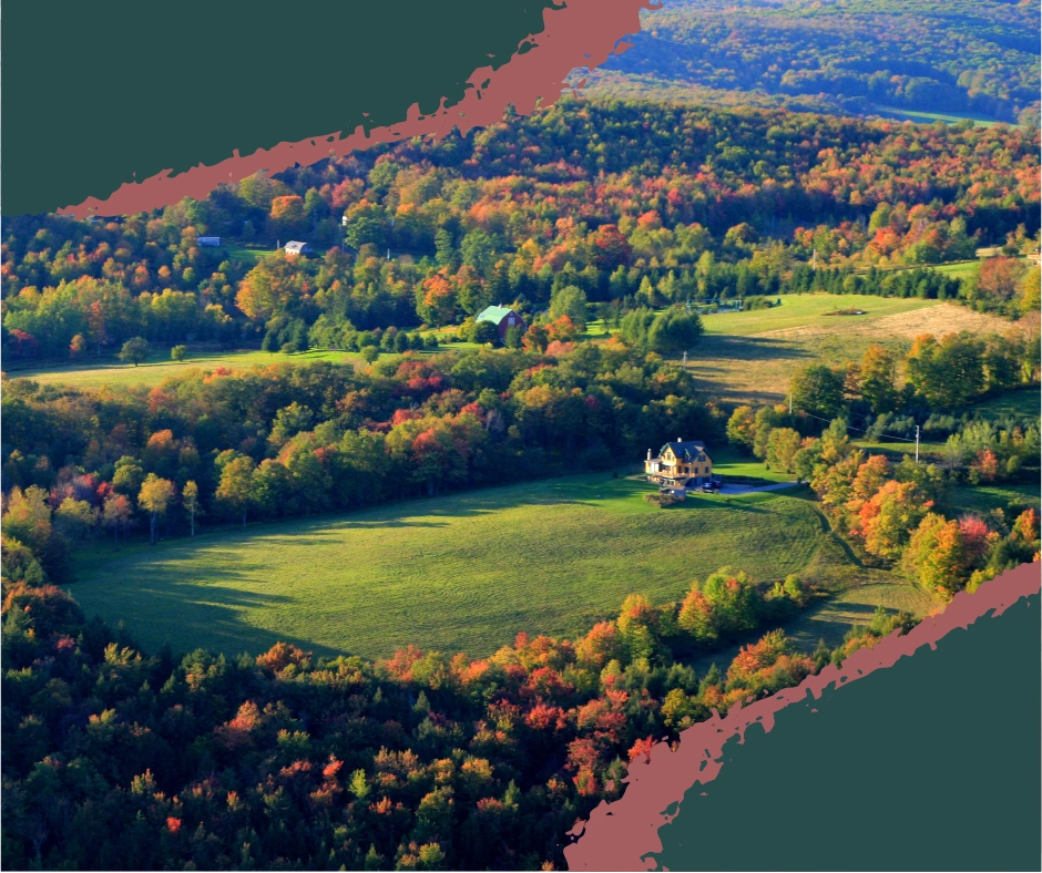 Fall colors surrounding a Catskill farm with pumpkins and hay bales. Catskill fall farm, autumn in Catskills, harvest season Catskills, Catskills pumpkin patch, fall foliage New York farm, things to do in the catskill mountains, things to do in the catskills, catskill ny, catskill mountains, woodstock, catskills with kids