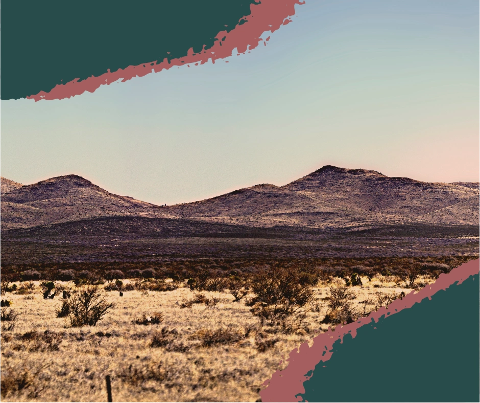 Family walking through desert landscape near Marfa, Texas.