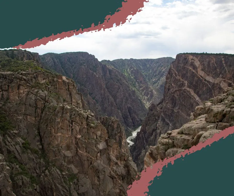 Sunset casting golden light on the Painted Wall, the tallest cliff in Colorado, at Black Canyon of the Gunnison National Park.