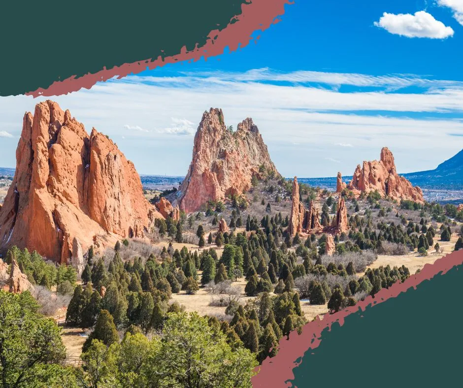 Towering red sandstone formations at Garden of the Gods with Pikes Peak in the background.