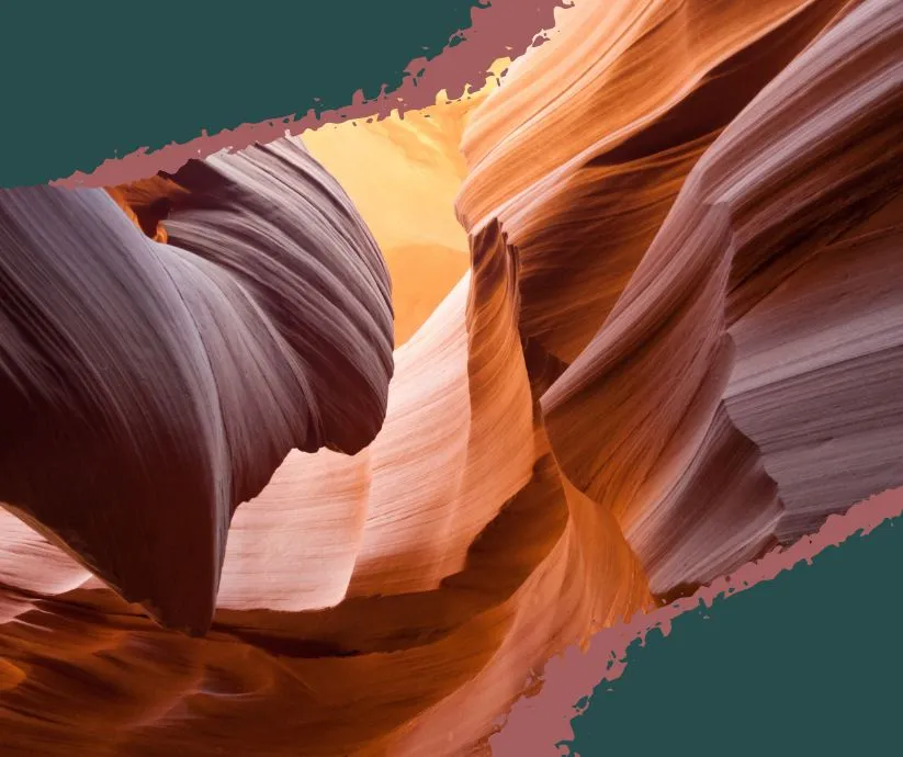 Light beams shining into the narrow passageways of Antelope Canyon