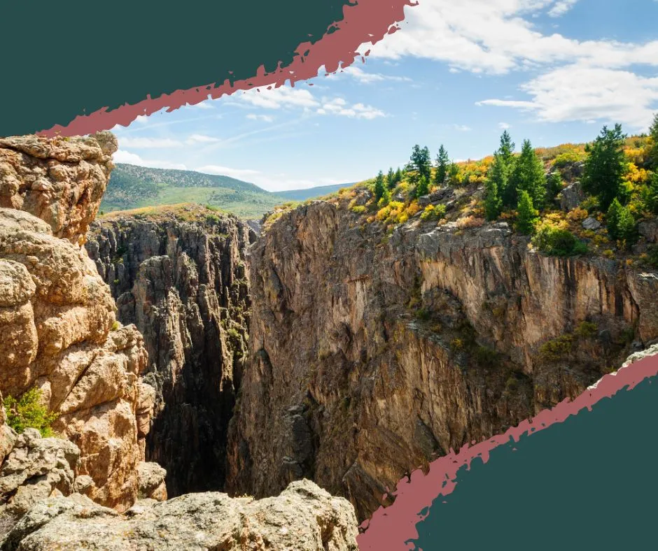 Aerial view of the Gunnison River winding through the steep cliffs of Black Canyon at Chasm View.