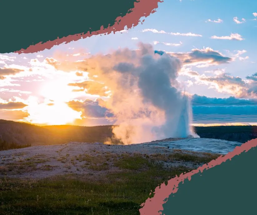 Old Faithful geyser erupting in Yellowstone National Park surrounded by a crowd